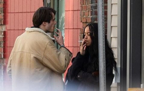 Malia smoking cigarettes with her boyfriend, Rory